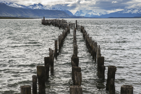 wood pilings leading out into the