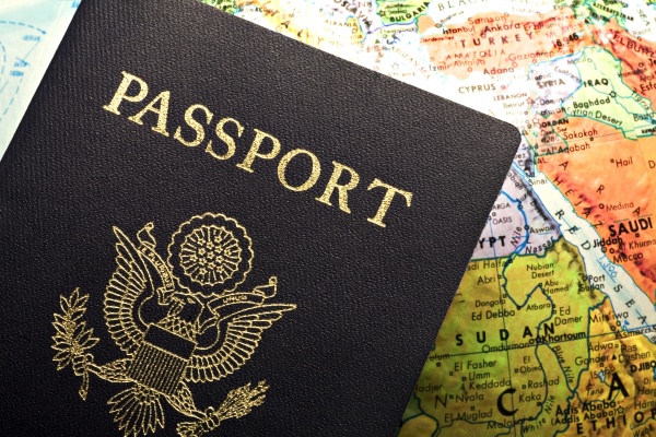 American Passport Laid Over A Map - Stock Photo #25673525 ...