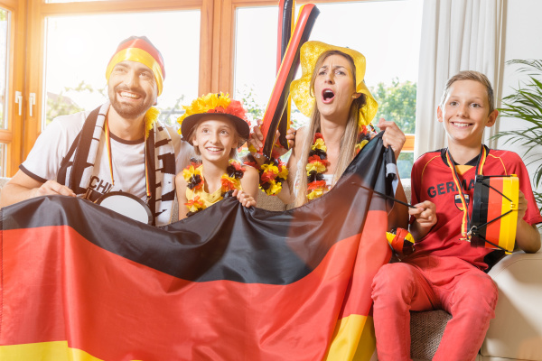 whole family cheering for the german
