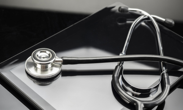 stethoscope on a tablet conceptual