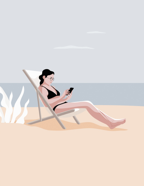 woman relaxing on beach using smart