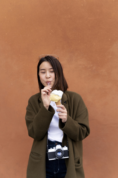 young woman eating an ice cream