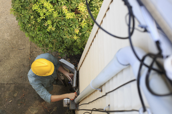 elevated view of cable installer working