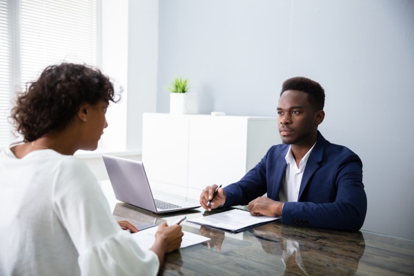 Young Businesspeople Sitting At Interview - Royalty free photo ...