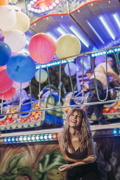 happy young woman on a funfair