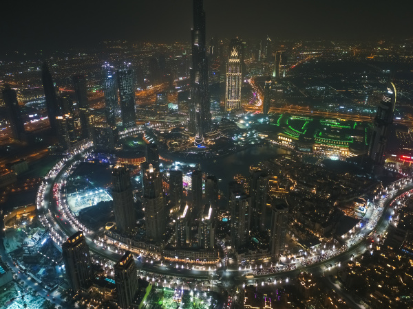 aerial view of illuminated skyscrapers and