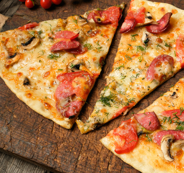 baked pizza with smoked sausages