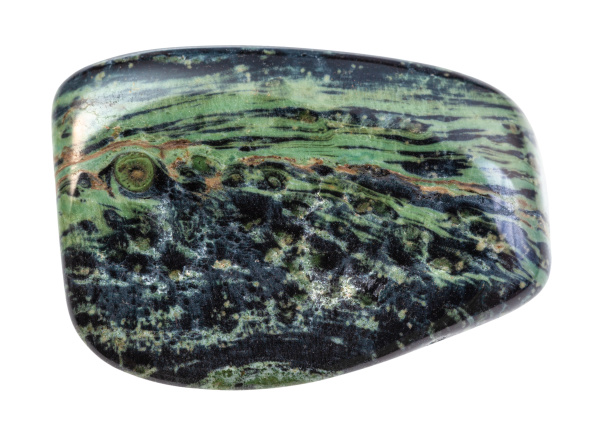 polished green rhyolite rock isolated on