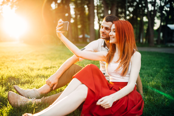 love couple makes selfie in summer