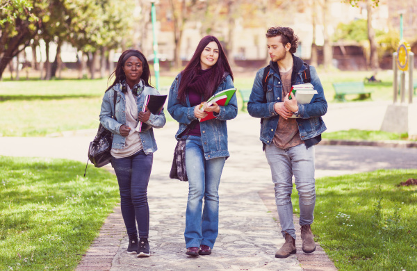 three students in the outdoor park