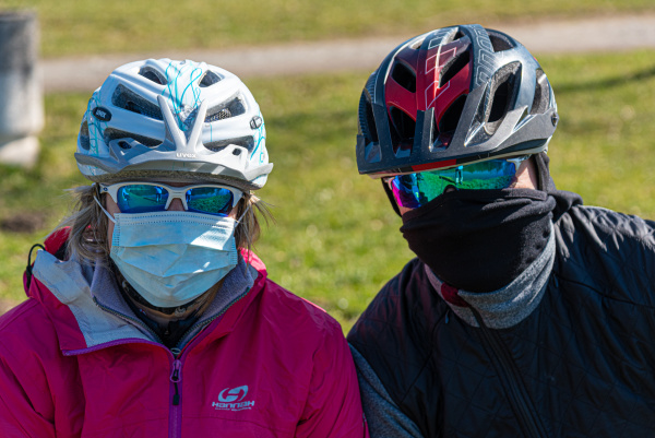 two cyclists protective mask