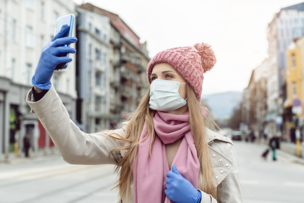 woman with medical mask and gloves