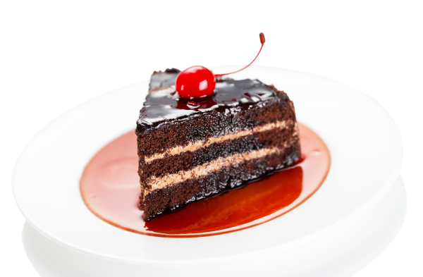 dark cake with a cherry and