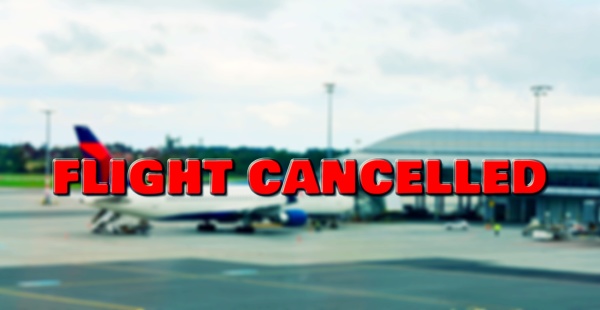 cancelled flight at airport gate due