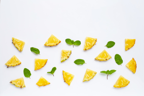 fresh pineapple pieces with green mint