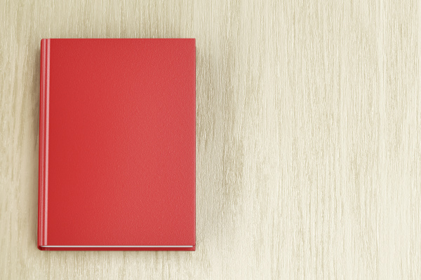 red book on wood background