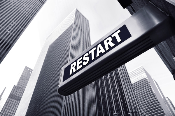 office building with a restart sign