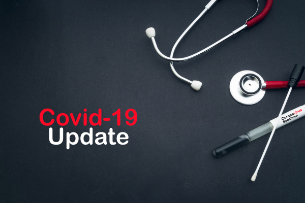 covid 19 update text with stethoscope