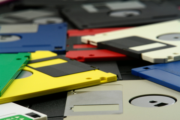 stack of vintage floppy drives
