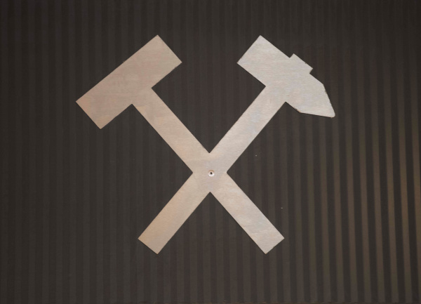 hammer and pickaxe as symbol for