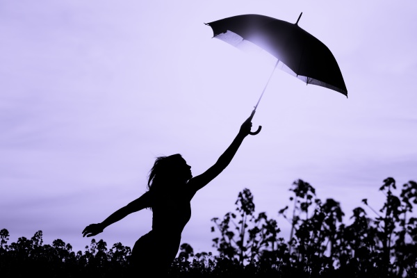 unplugged free silhouette woman with umbrella