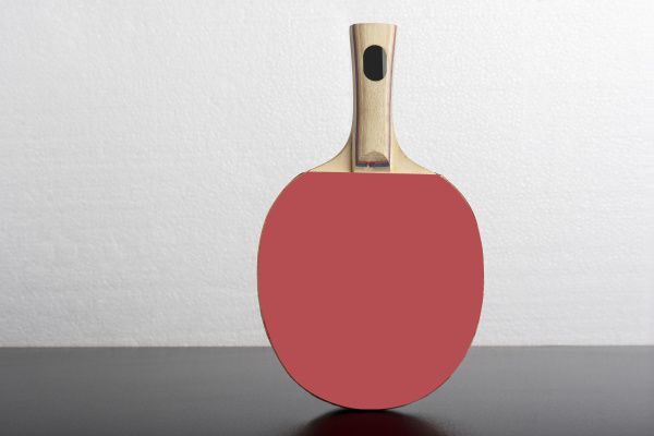 table tennis racket in front of