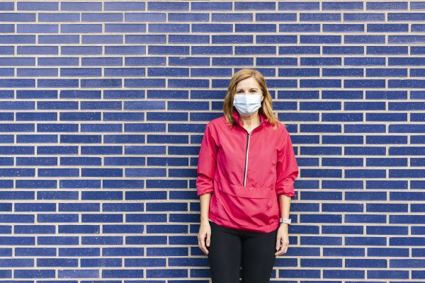 woman with surgical mask in front