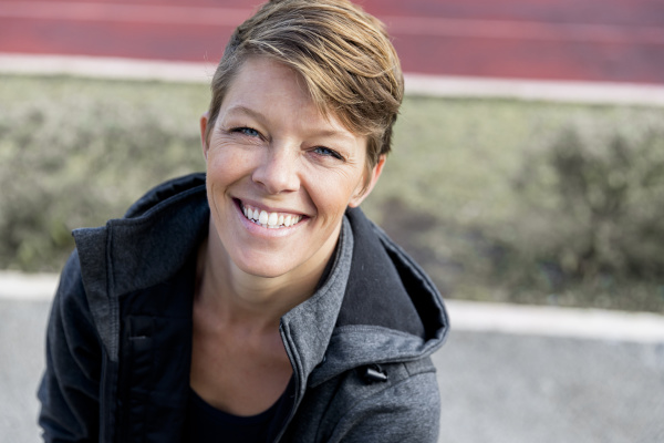 portrait of smiling athletic woman