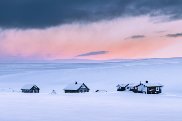 remote vacation homes in winter landscape