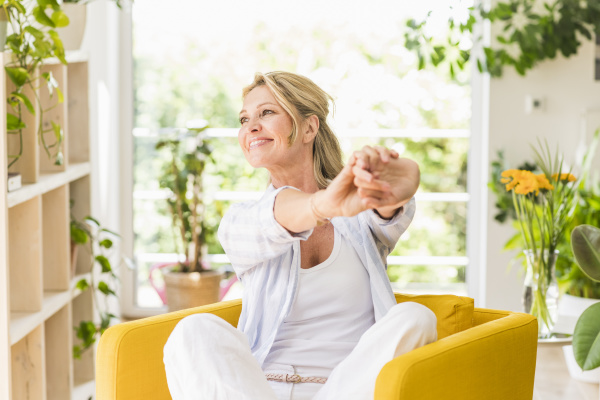 portrait of happy mature woman relaxing