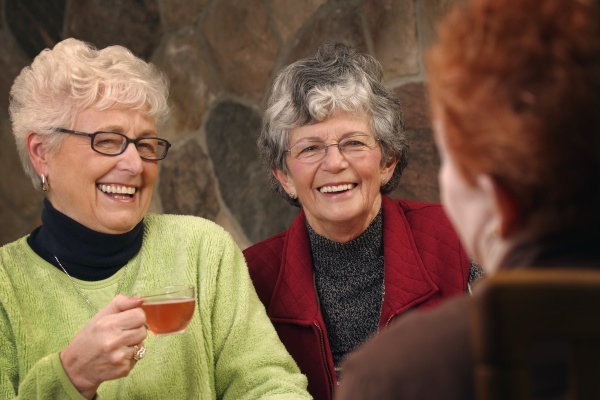 three elderly ladies having a discussion