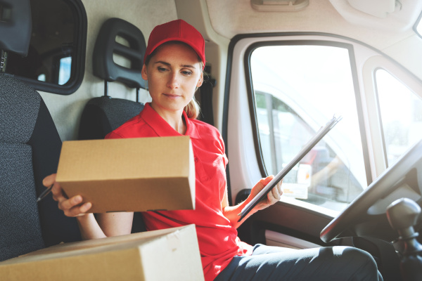 female delivery service worker in red