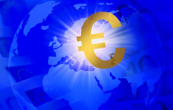 euro symbol over globe showing europe