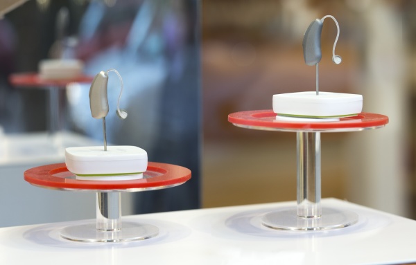 modern hearing aid devices displayed on