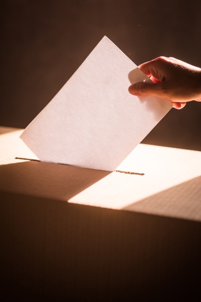 conceptual image of a person voting