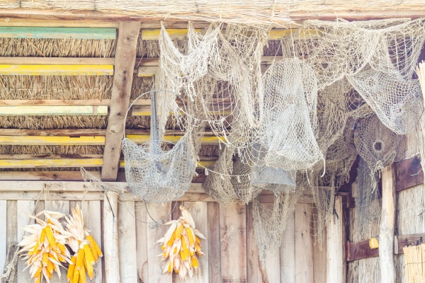 fishing nets hanging under the canopy