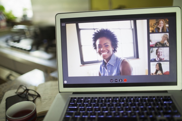 happy women friends video conferencing on