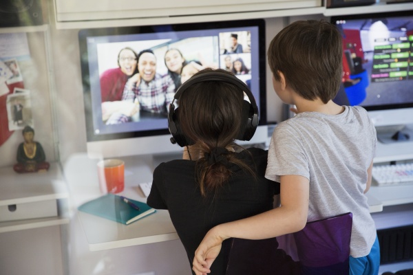 kids video conferencing with friends on