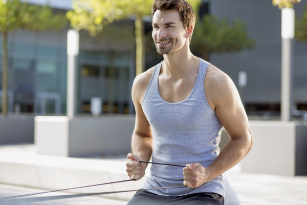 portrait of smiling man training with