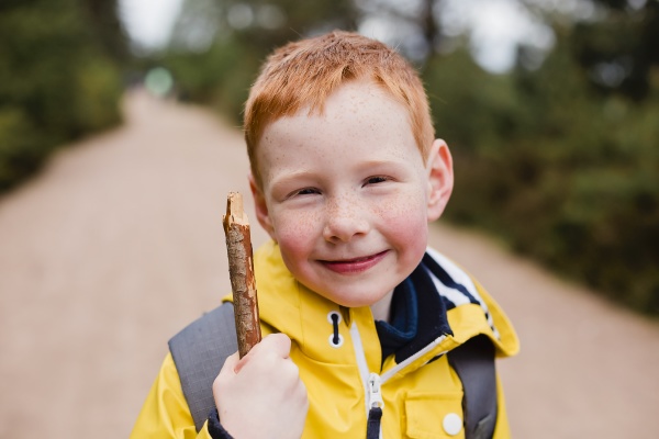 portrait of redheaded little boy with