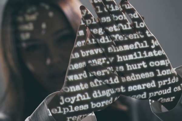projected words on woman s palms