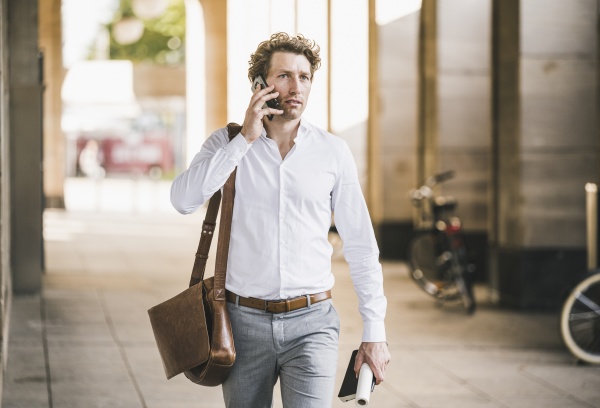 man talking on mobile phone while