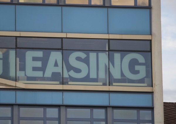 leasing sign and financial prosperity