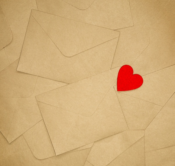 brown various envelopes with red heart