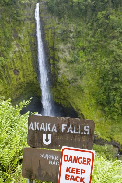 warning sign with a waterfall in
