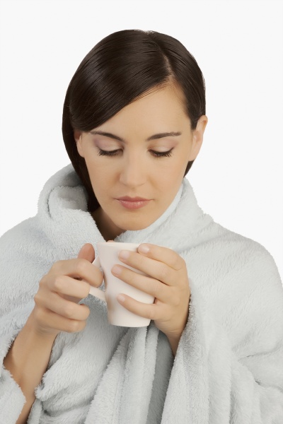 woman taking hot drink