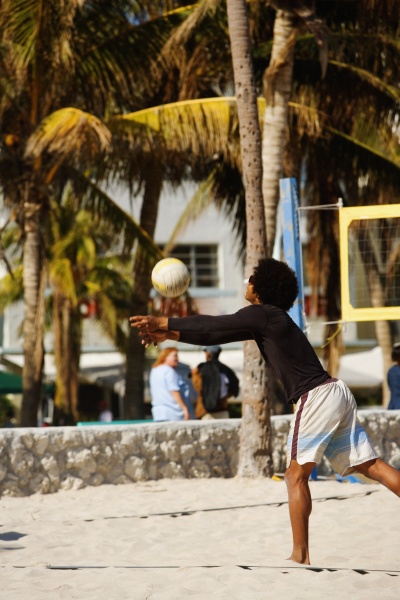 side profile of a man playing