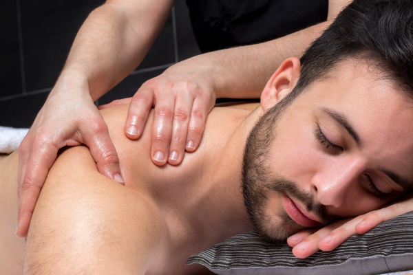 close up shoulder massage on young