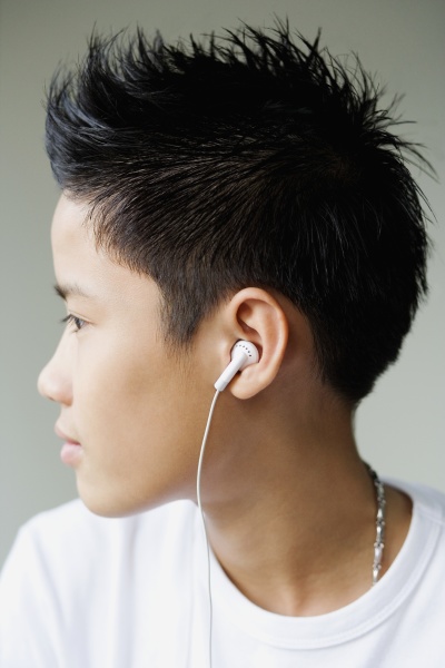 side profile of a boy listening