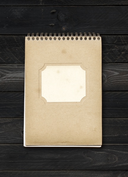closed spiral note book on a